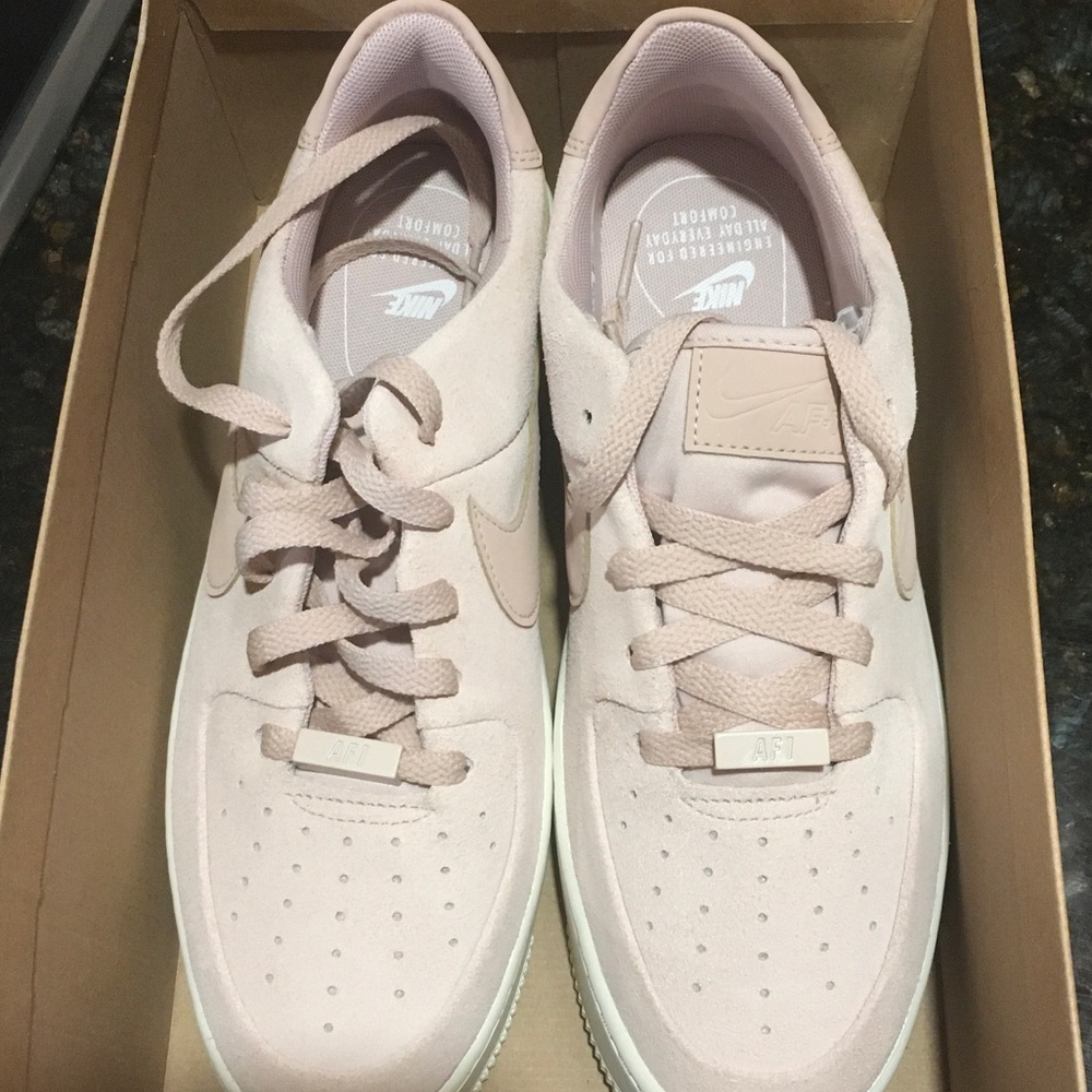 Nike Women’s Light Pink Low-Top Suede Sneakers